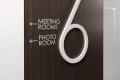 Vivid House Number | Custom Commercial Sign | Number 6 with meeting rooms and photo room signs on a brown wooden wall | Brushed  Aluminum White Finish