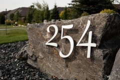 Residential House Numbers | Material: 3/8" aluminum | Finish: Brushed Aluminum | Font: Custom | Size: Various | Substrate: Stone Slab