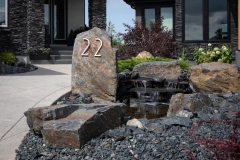 Residential House Numbers | Material: 3/8" aluminum | Finish: Brushed Aluminum | Font: TimeBurner | Size: 8" | Substrate: Stone Slab
