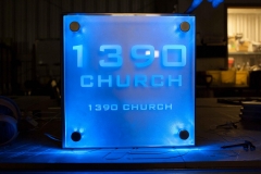 Vivid House Number | Custom Commercial Sign | 1390 Church with a blue LED backlight on a translucent sign