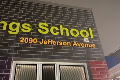 Vivid House Number | Custom Commercial Sign | Ecole Waterford Springs School 2090 Jefferson Avenue | Brushed Green and Orange Finish | Brick Wall