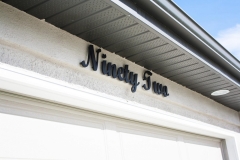 Residential House Numbers | Material: 3/8" aluminum | Finish: Black paint | Font: Custom | Size: 8" | Substrate: Stucco