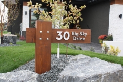 Residential House Numbers | Material: 3/8" aluminum | Finish: Brushed Aluminum | Font: Custom | Size: Various | Substrate: Wood sign