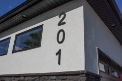 Residential House Numbers | Material: 3/8" aluminum | Finish: Black paint | Font: Arial | Size: 12" | Substrate: Stucco