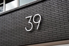 Residential House Numbers | Material: 3/8" aluminum | Finish: Brushed Aluminum | Font: TimeBurner | Size: 12" | Substrate: Brick