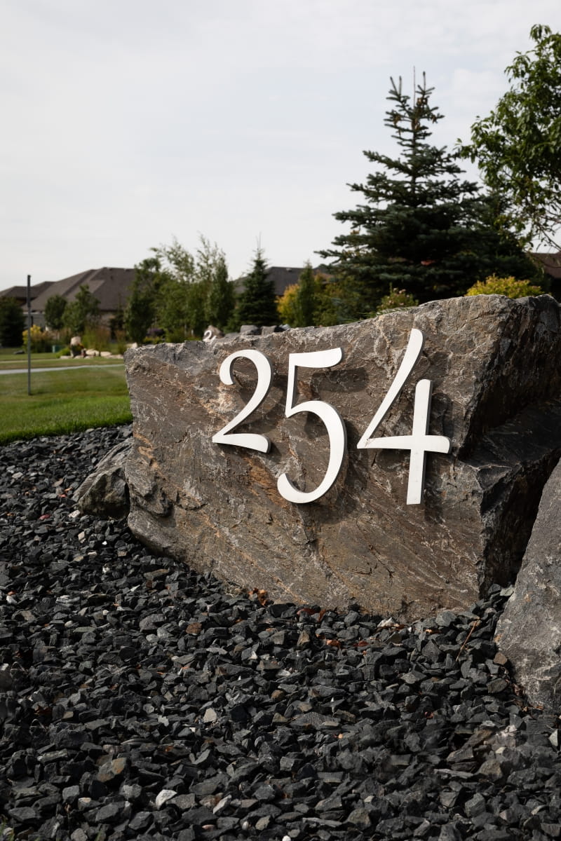 Residential House Numbers | Material: 3/8" aluminum | Finish: Brushed Aluminum | Font: Custom | Size: Various | Substrate: Stone Slab