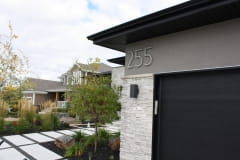 Residential House Numbers | Material: 3/8" aluminum | Finish: Brushed Aluminum | Font: TimeBurner | Size: 12" | Substrate: Stucco